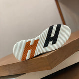 Hermès Black Flat Thong Sandals - Back View