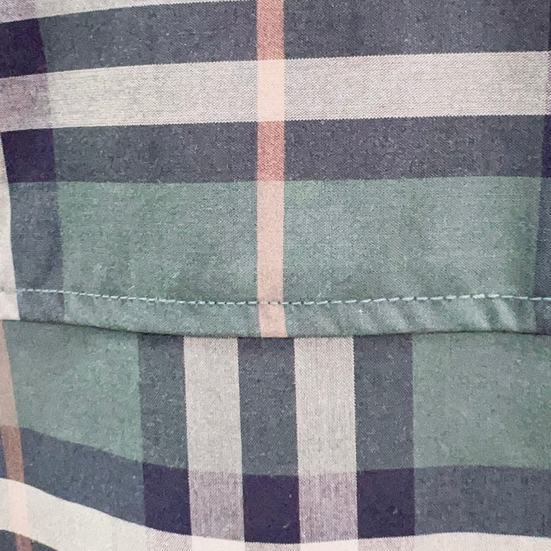 Side profile view of Burberry luxury piece style No.061