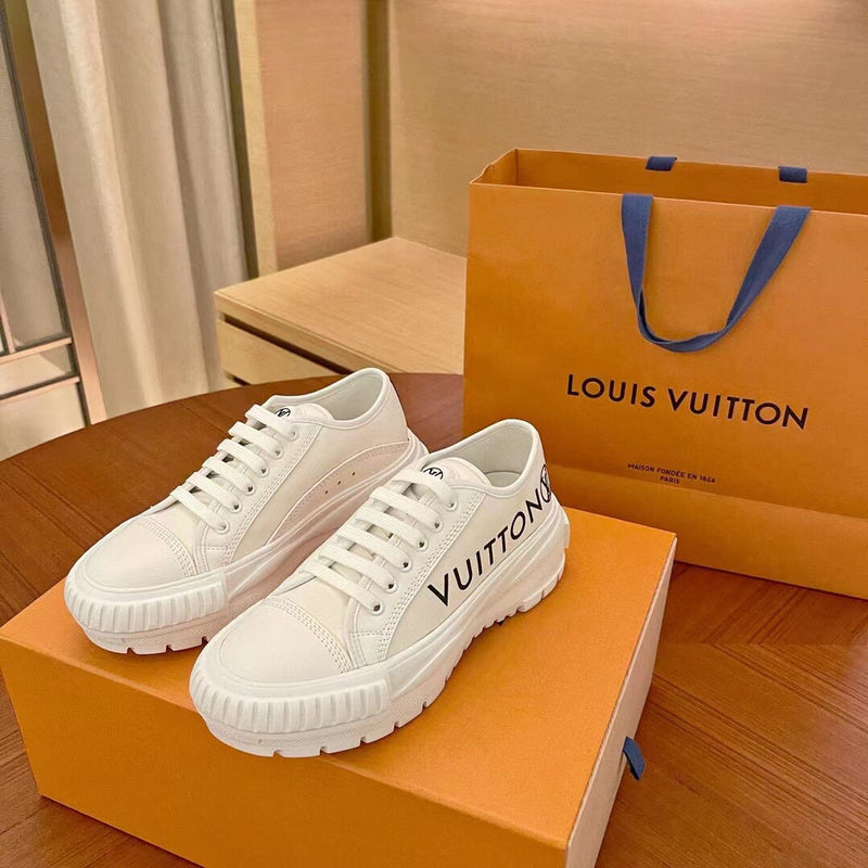 Louis Vuitton Black High-Top Sneakers - Side Profile View