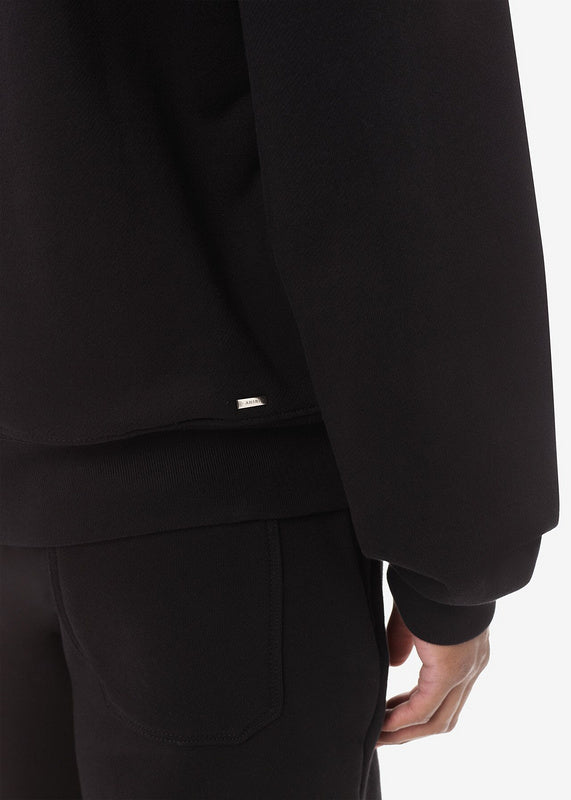 Side profile view of Amiri luxury piece style No.031