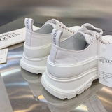 Alexander McQueen shoes Style 296 - close-up of iconic logo design
