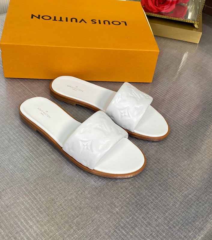 Louis Vuitton White Loafer Flats - Angled View