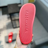 Balenciaga sandals Style 025 - close-up of iconic logo design