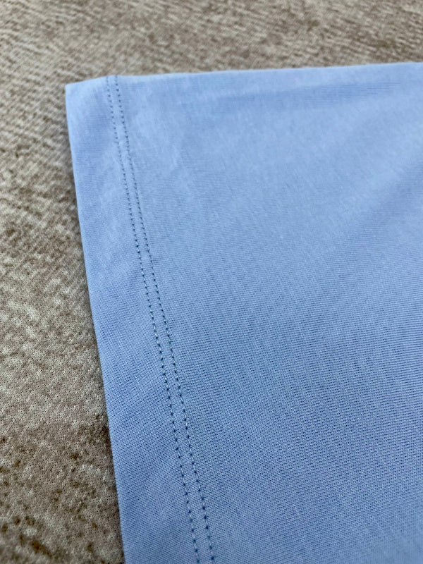 Three-quarter angle view of Amiri luxury piece style No.152