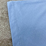 Three-quarter angle view of Amiri luxury piece style No.152