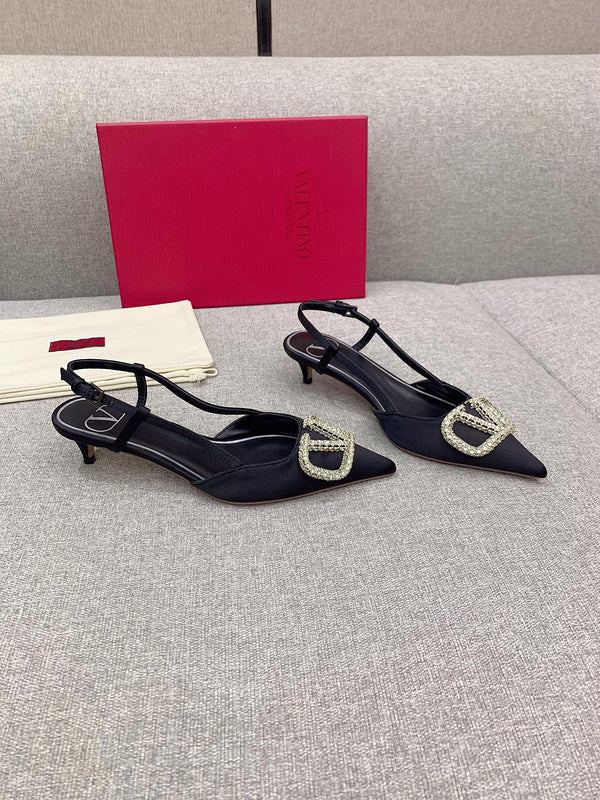Three-quarter angle view of Valentino Garavani luxury piece style No.207