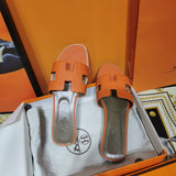 Hermès Red Espadrille Wedge Sandals - Close-Up Texture View