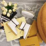 Side profile view of Louis Vuitton luxury piece style No.154
