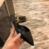 Louis Vuitton Black Low-Top Sneakers - Close-Up Texture View