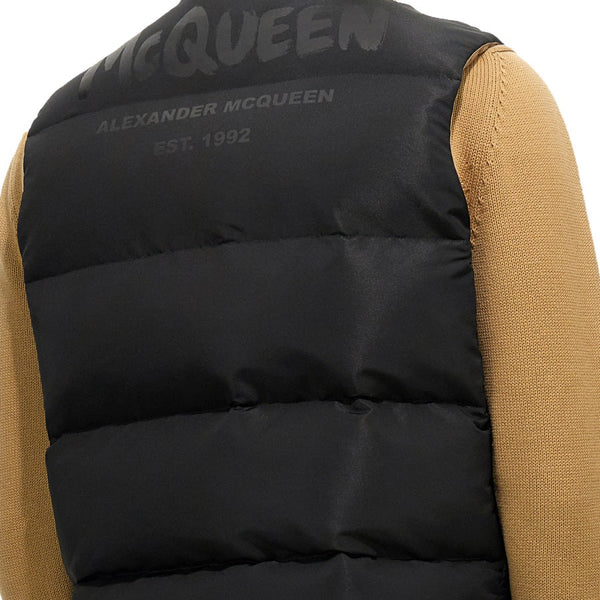 Close-up of Alexander McQueen vests hardware and fine stitching