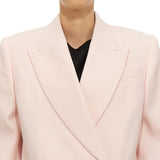 Close-up of Alexander McQueen jackets hardware and fine stitching