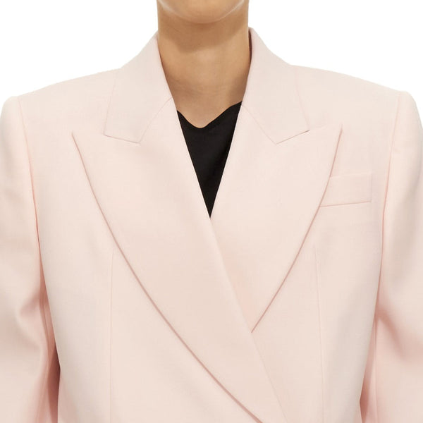 Close-up of Alexander McQueen jackets hardware and fine stitching