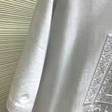 Texture and finish detail of Balmain luxury piece style No.073