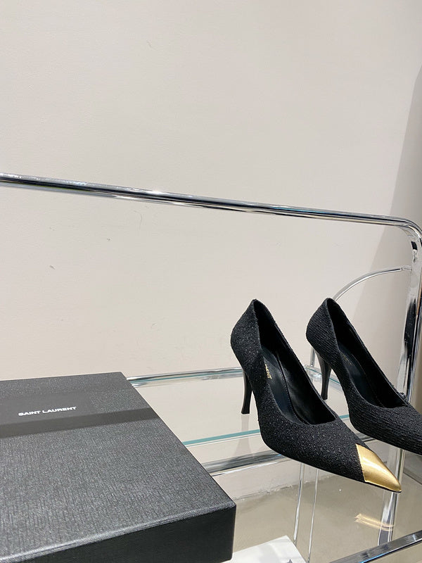 Side profile view of Saint Laurent luxury piece style No.002