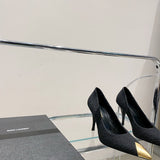 Side profile view of Saint Laurent luxury piece style No.002
