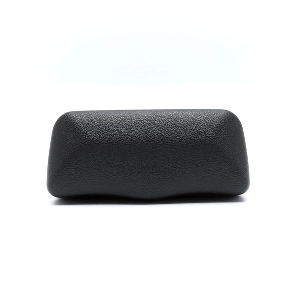 Close-up of Balenciaga sunglasses hardware and fine stitching