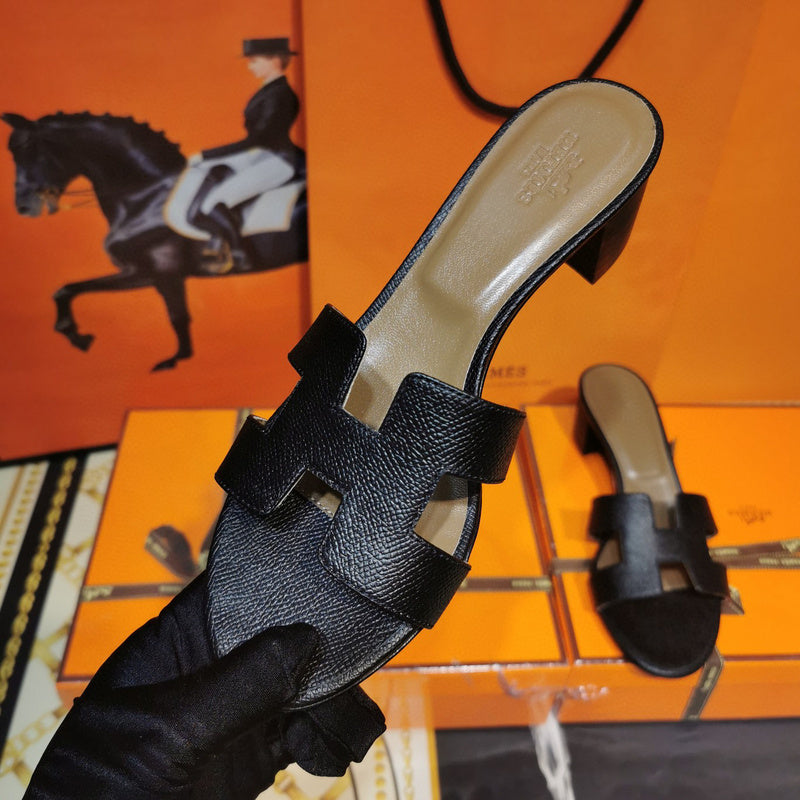 Hermès White Crisscross Strap Sandals - Angled View
