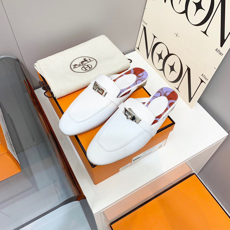 Hermès White Slide Sandals - Sole Detail View