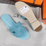 Hermes sandals Style 028 - logo and branding close-up