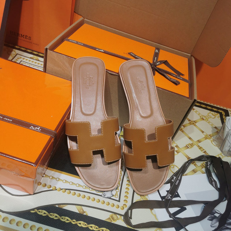 Hermès Red Crisscross Strap Sandals - Lifestyle Styling Shot