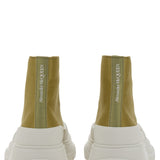 Alexander McQueen athletic side profile designer luxury fashion
