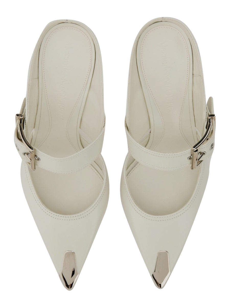 Close-up of Alexander McQueen pumps hardware and fine stitching