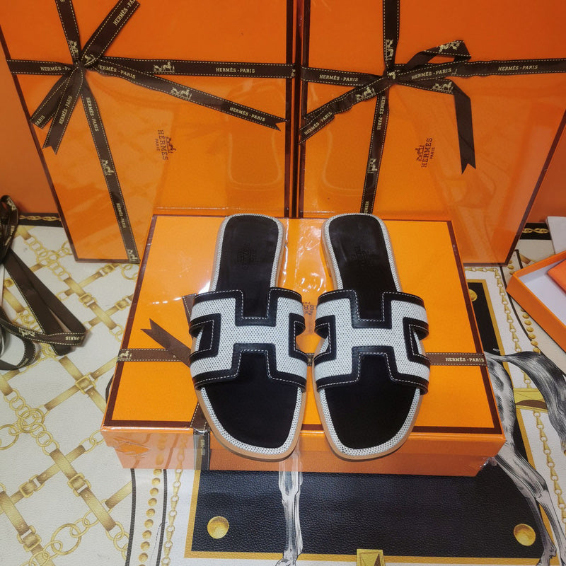 Hermes sandals Style 045 - angled studio shot