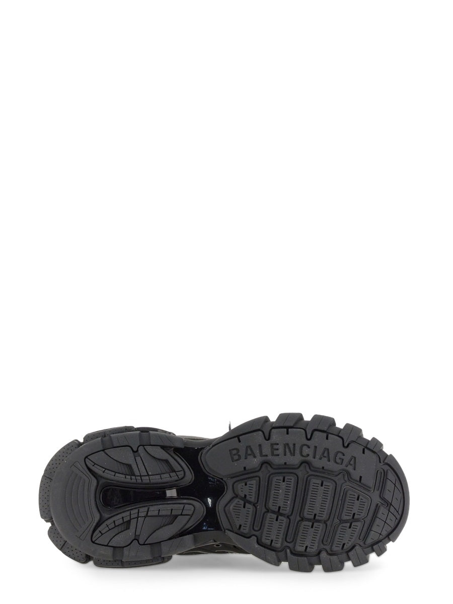 Close-up of Balenciaga sneakers hardware and fine stitching