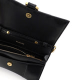 Balenciaga clutches side profile designer luxury fashion
