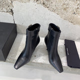 Texture and finish detail of Saint Laurent luxury piece style No.049