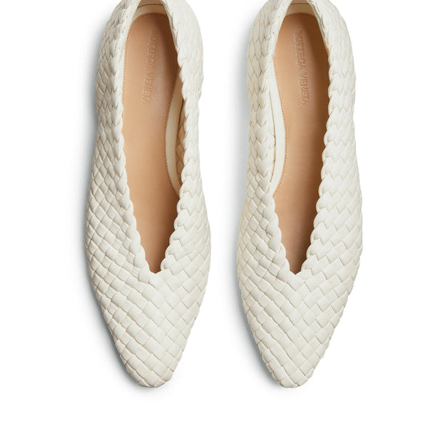 Close-up of Bottega Veneta flats hardware and fine stitching