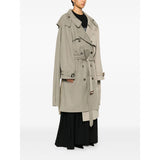 Close-up of Balenciaga coats hardware and fine stitching