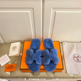 Hermes sandals Style 077 - front view, iconic logo design