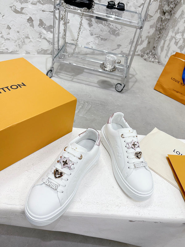 Louis Vuitton Nude Slip-On Sneakers - Angled View