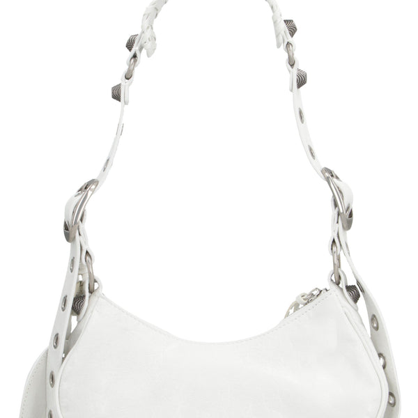 Close-up of Balenciaga crossbody hardware and fine stitching
