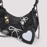 Close-up of Balenciaga handbags hardware and fine stitching