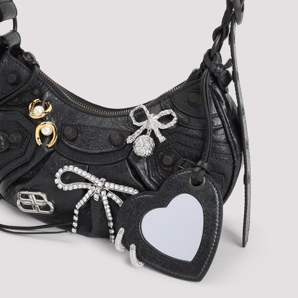 Close-up of Balenciaga handbags hardware and fine stitching