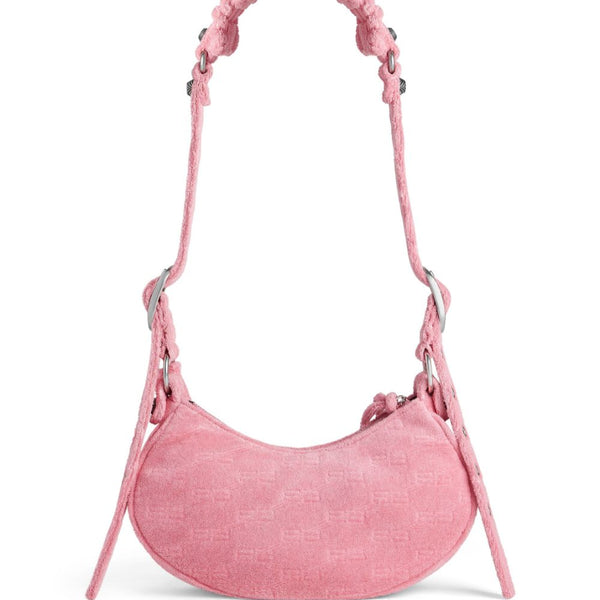 Close-up of Balenciaga handbags hardware and fine stitching