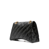 Close-up of Balenciaga cross body bags hardware and fine stitching