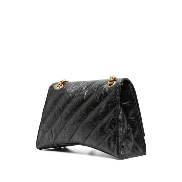Close-up of Balenciaga cross body bags hardware and fine stitching