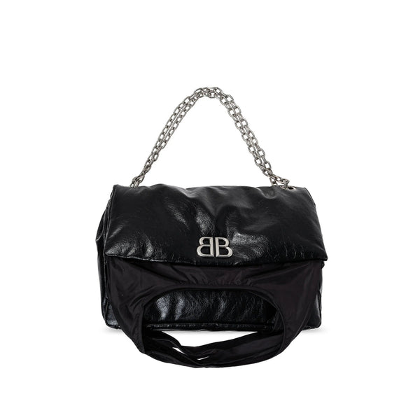 Close-up of Balenciaga totes hardware and fine stitching