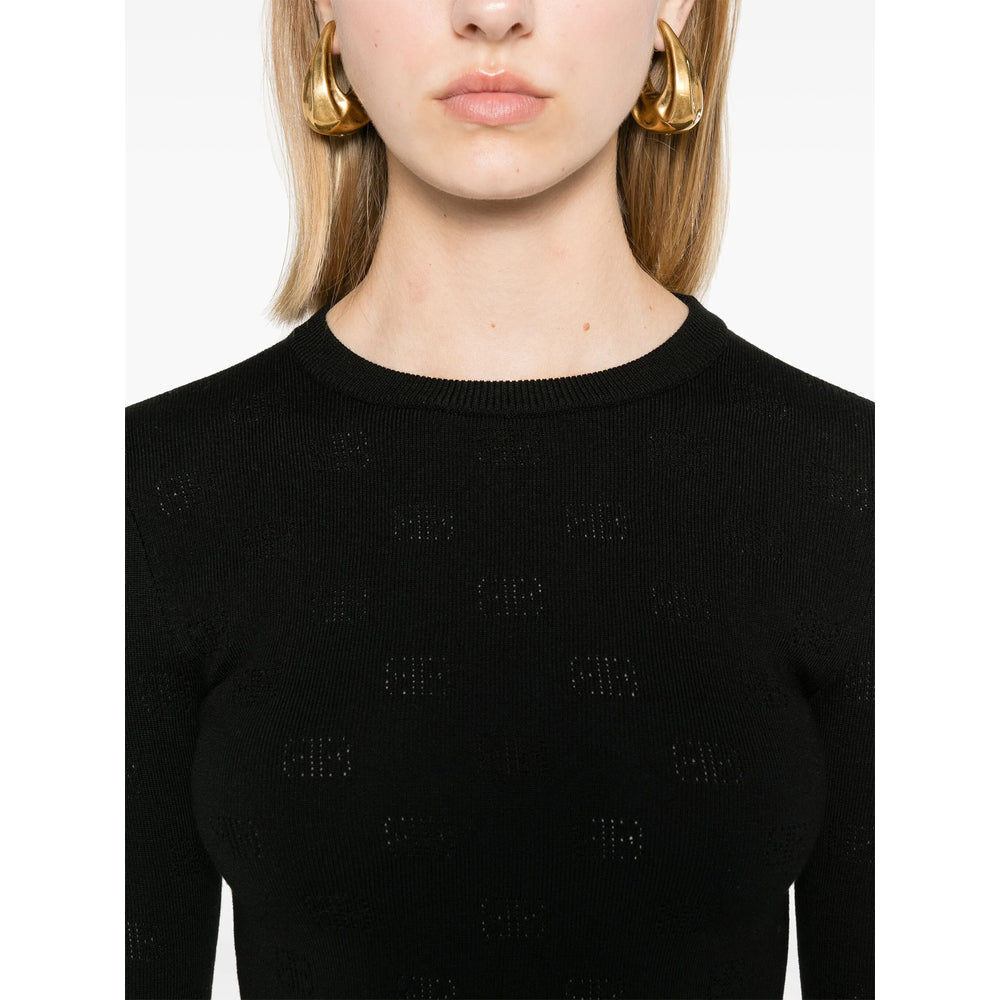Close-up of Balenciaga sweaters & pullovers hardware and fine stitching