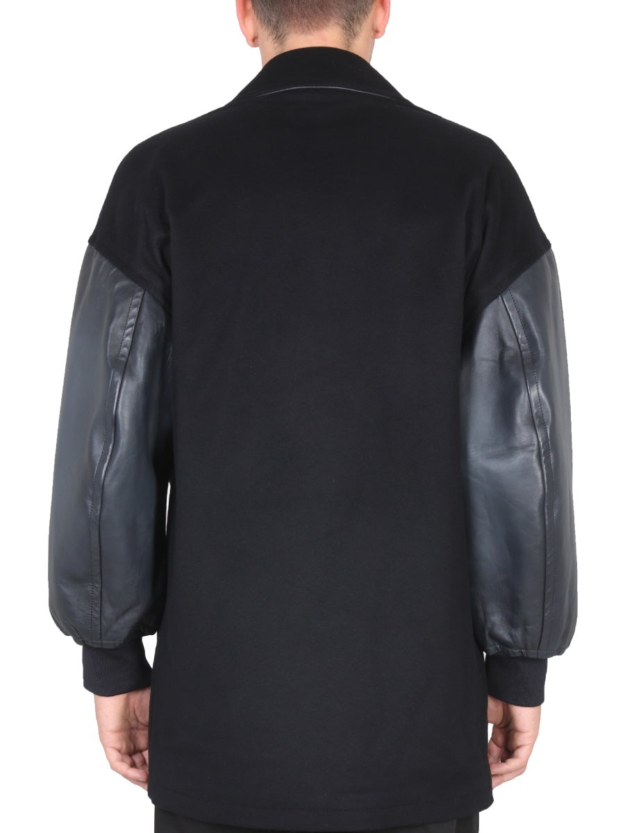 Alexander McQueen coats side profile designer luxury fashion