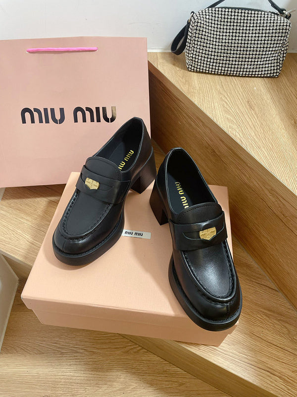 Side profile view of Miu Miu luxury piece style No.111