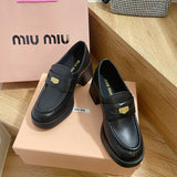 Side profile view of Miu Miu luxury piece style No.111