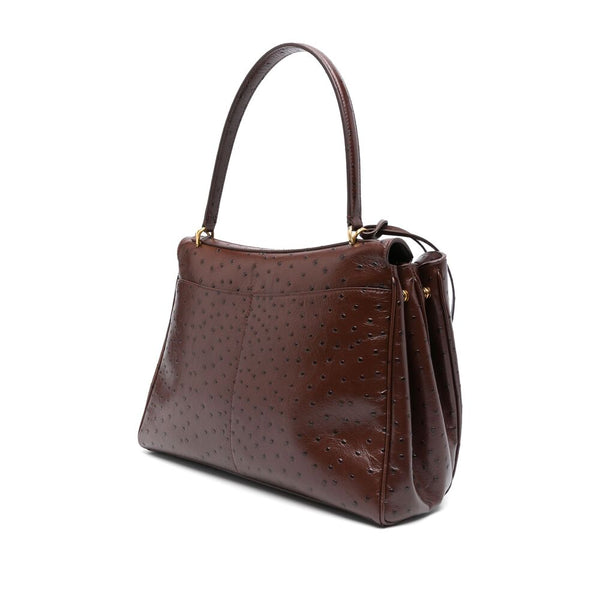 Close-up of Balenciaga totes hardware and fine stitching