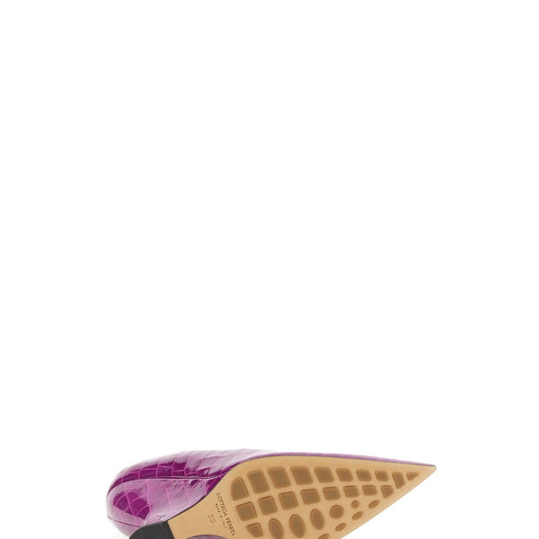 Close-up of Bottega Veneta sandals hardware and fine stitching