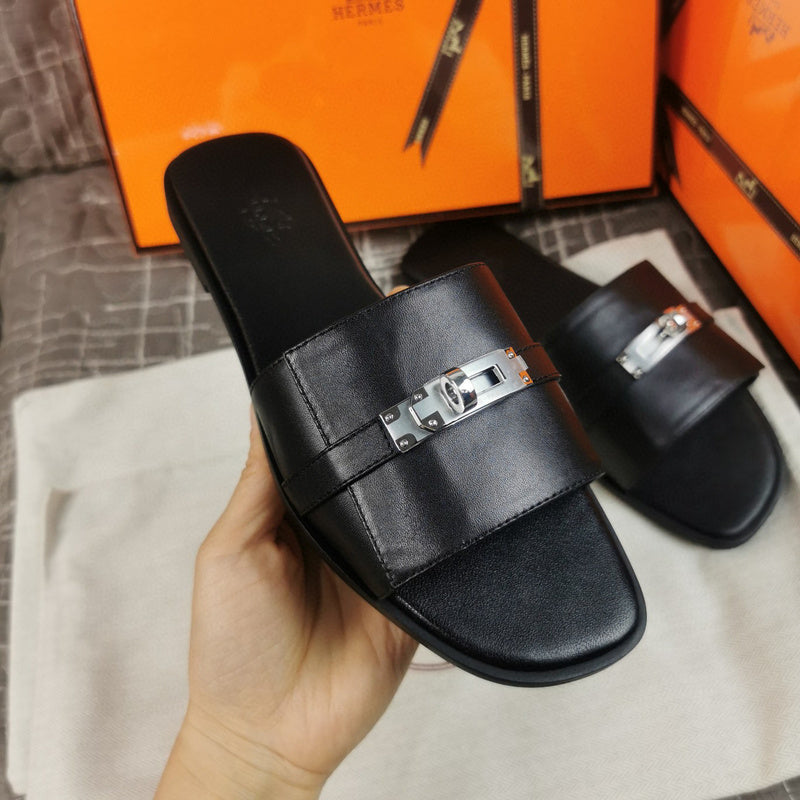 Hermès Burgundy Flat Thong Sandals - Angled View
