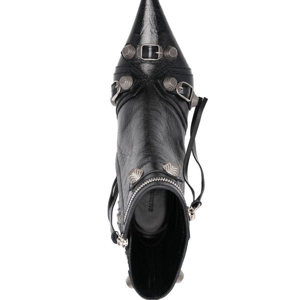 Close-up of Balenciaga boots hardware and fine stitching