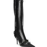 Close-up of Balenciaga boots hardware and fine stitching